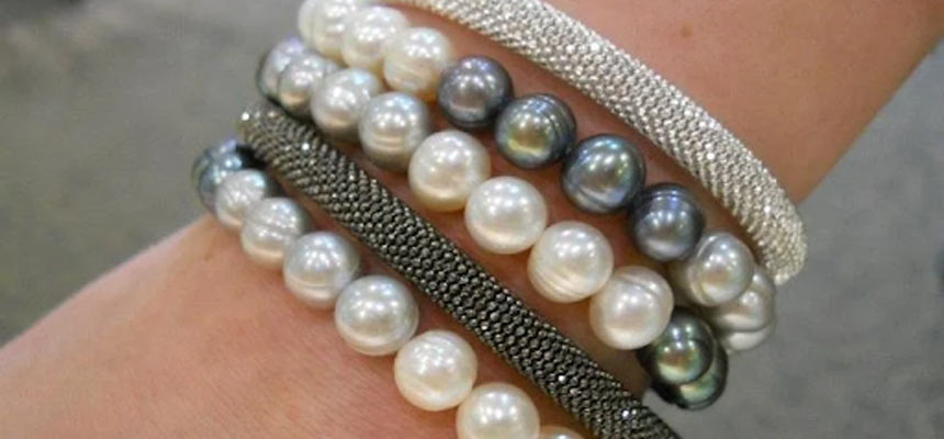 Adding some pearl bracelets